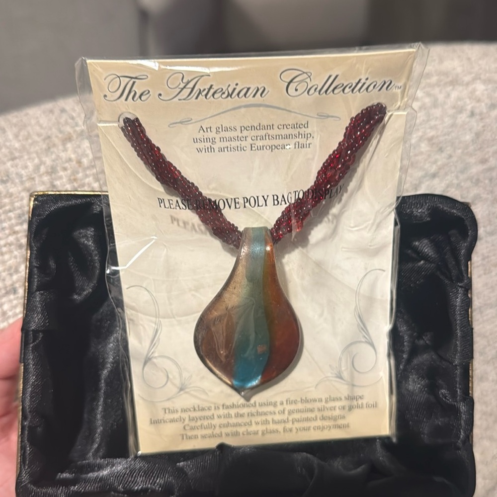 The Artisan collection necklace NWT

9” long beads plus pendant 11”
